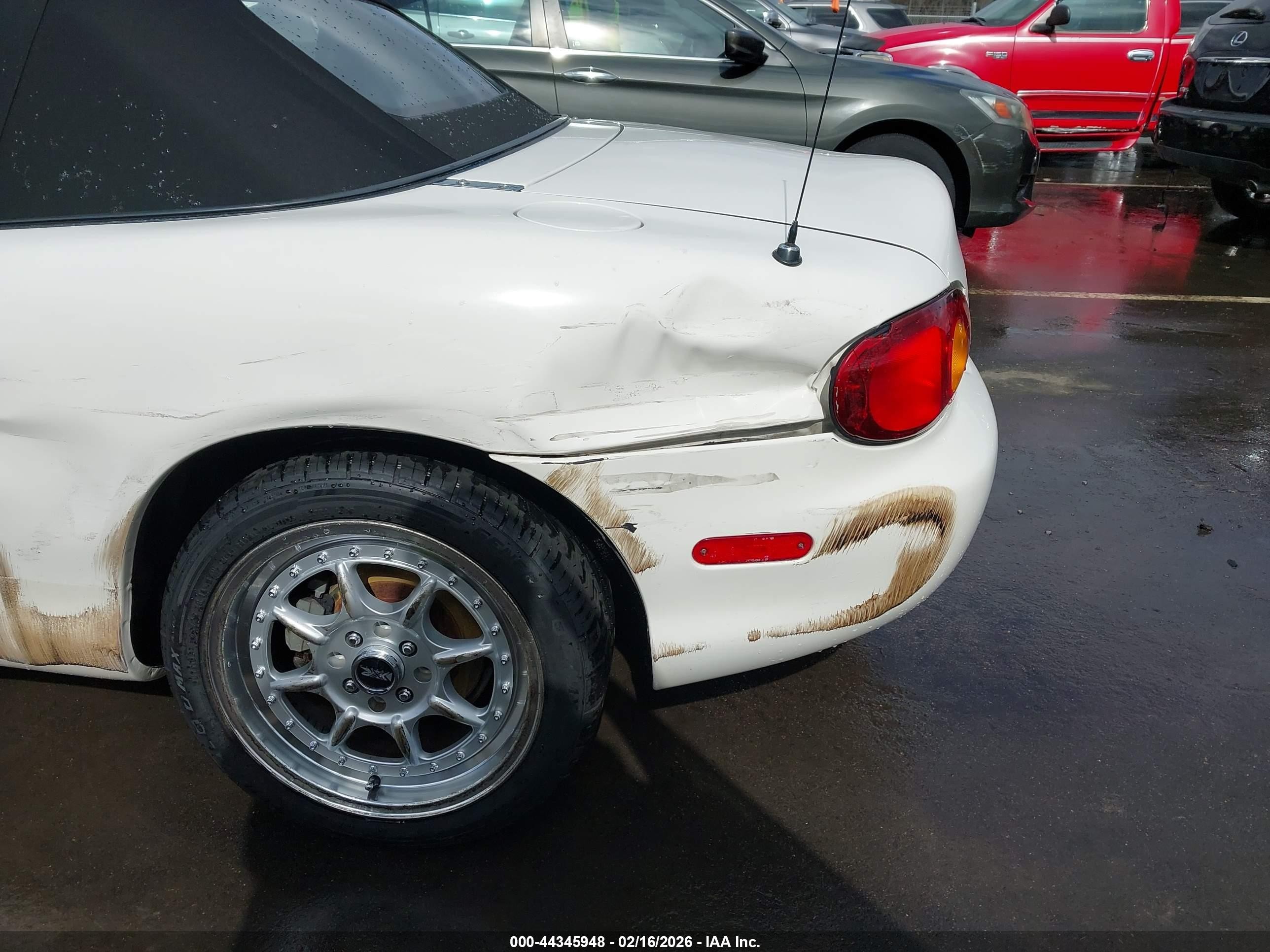 1999 Mazda Mx-5 Miata   White vin: JM1NB353XX0103571