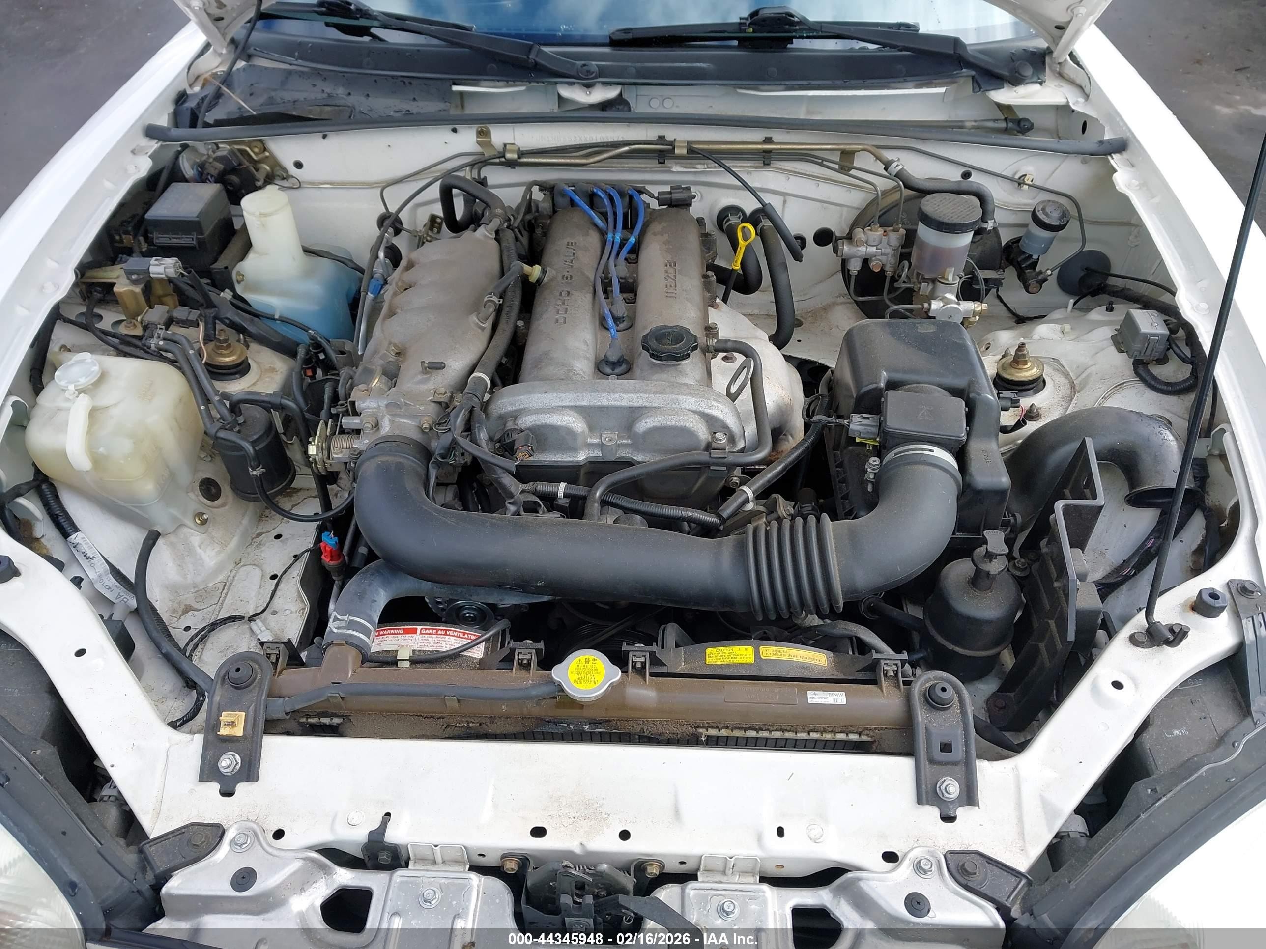 1999 Mazda Mx-5 Miata   White vin: JM1NB353XX0103571