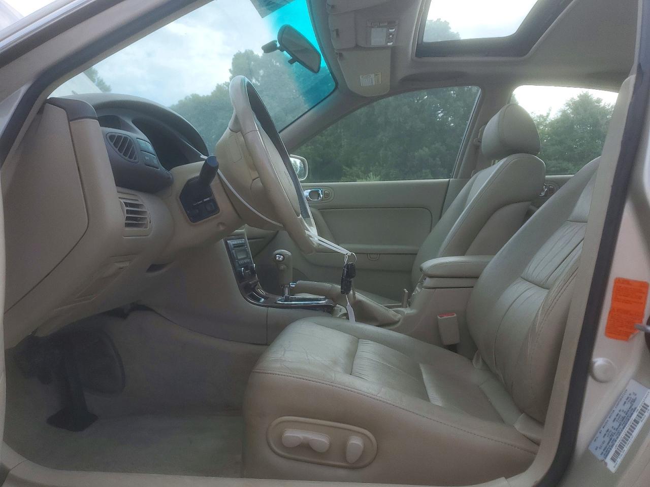 2002 Mazda Millenia Beige vin: JM1TA221121730007