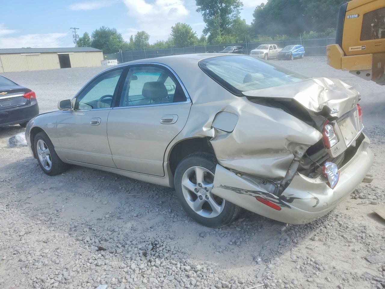 2002 Mazda Millenia Beige vin: JM1TA221121730007