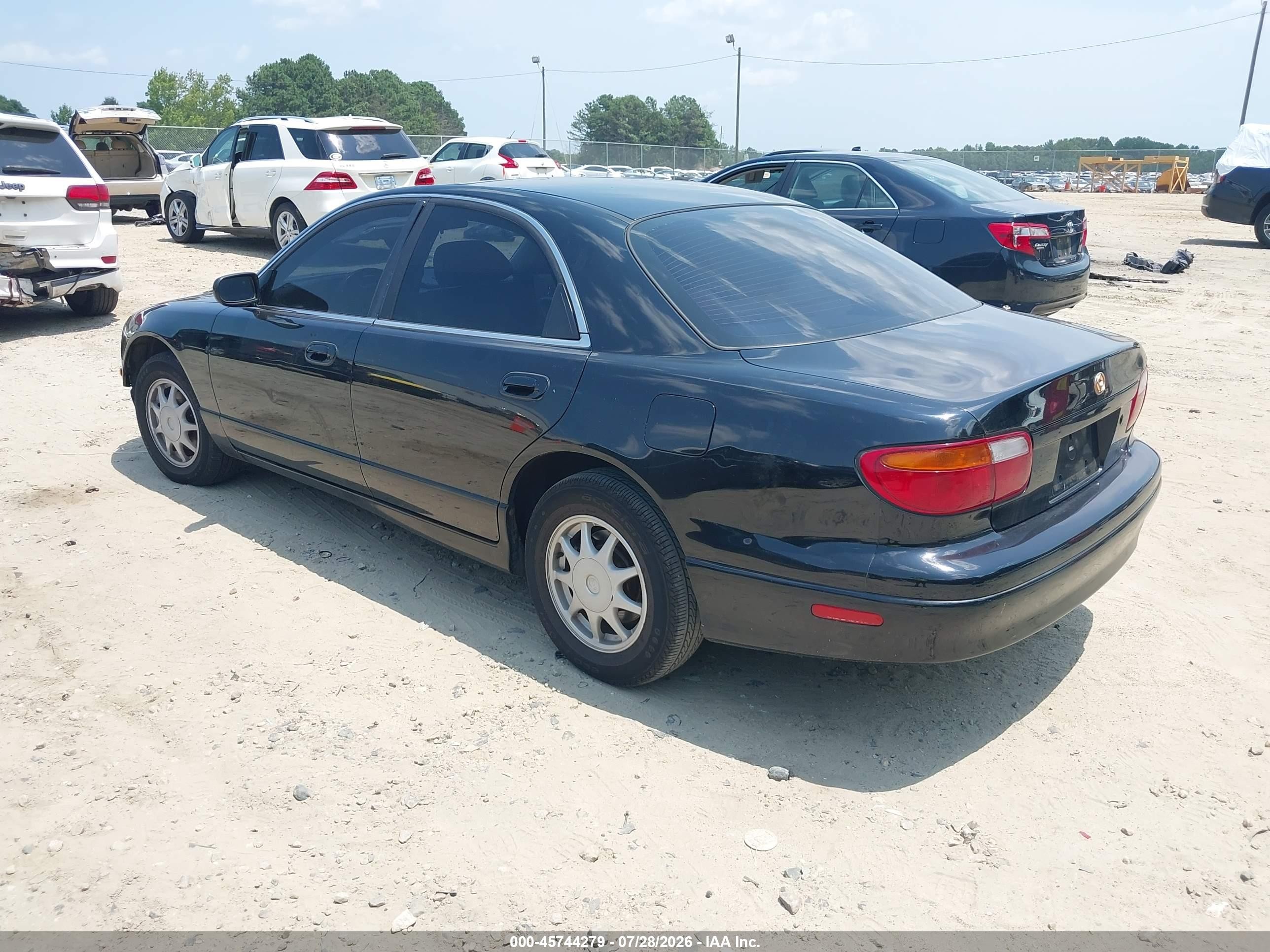 1996 Mazda Millenia L Black vin: JM1TA2218T1209528