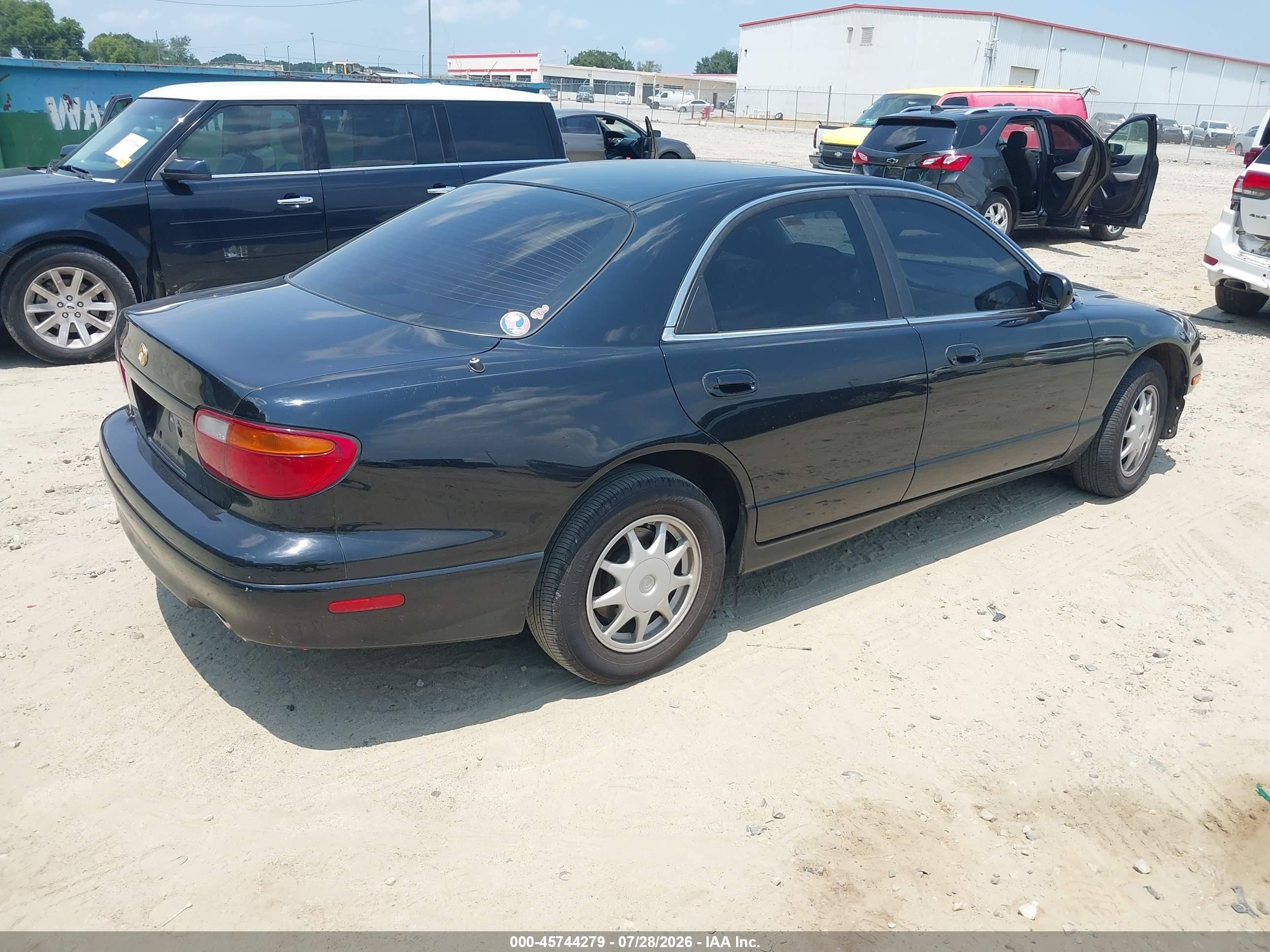 1996 Mazda Millenia L Black vin: JM1TA2218T1209528