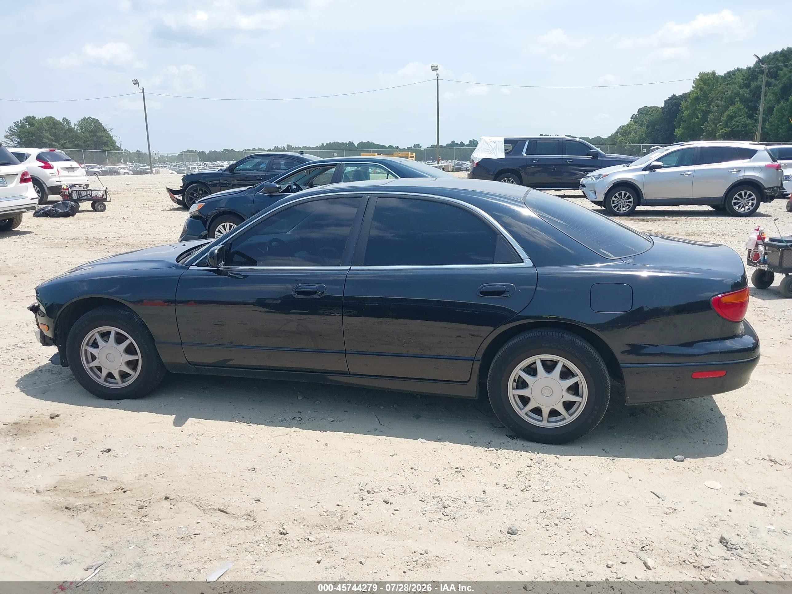 1996 Mazda Millenia L Black vin: JM1TA2218T1209528