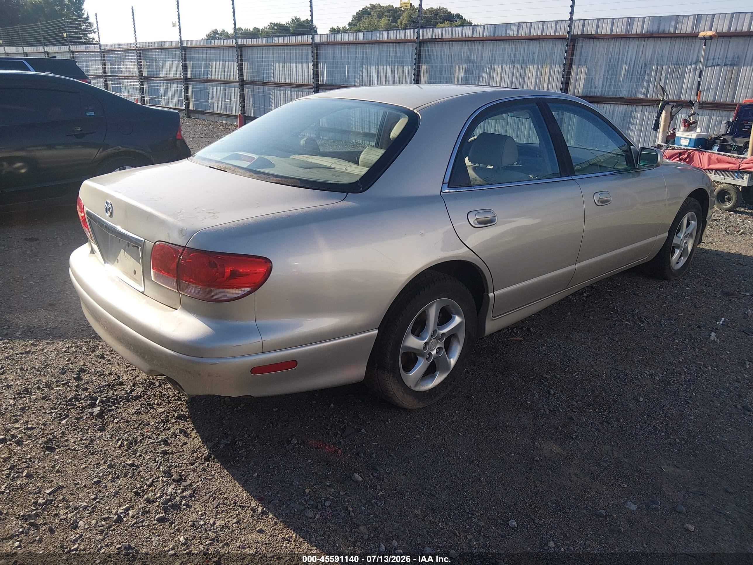 2002 Mazda Millenia P/ps Gold vin: JM1TA221X21719037
