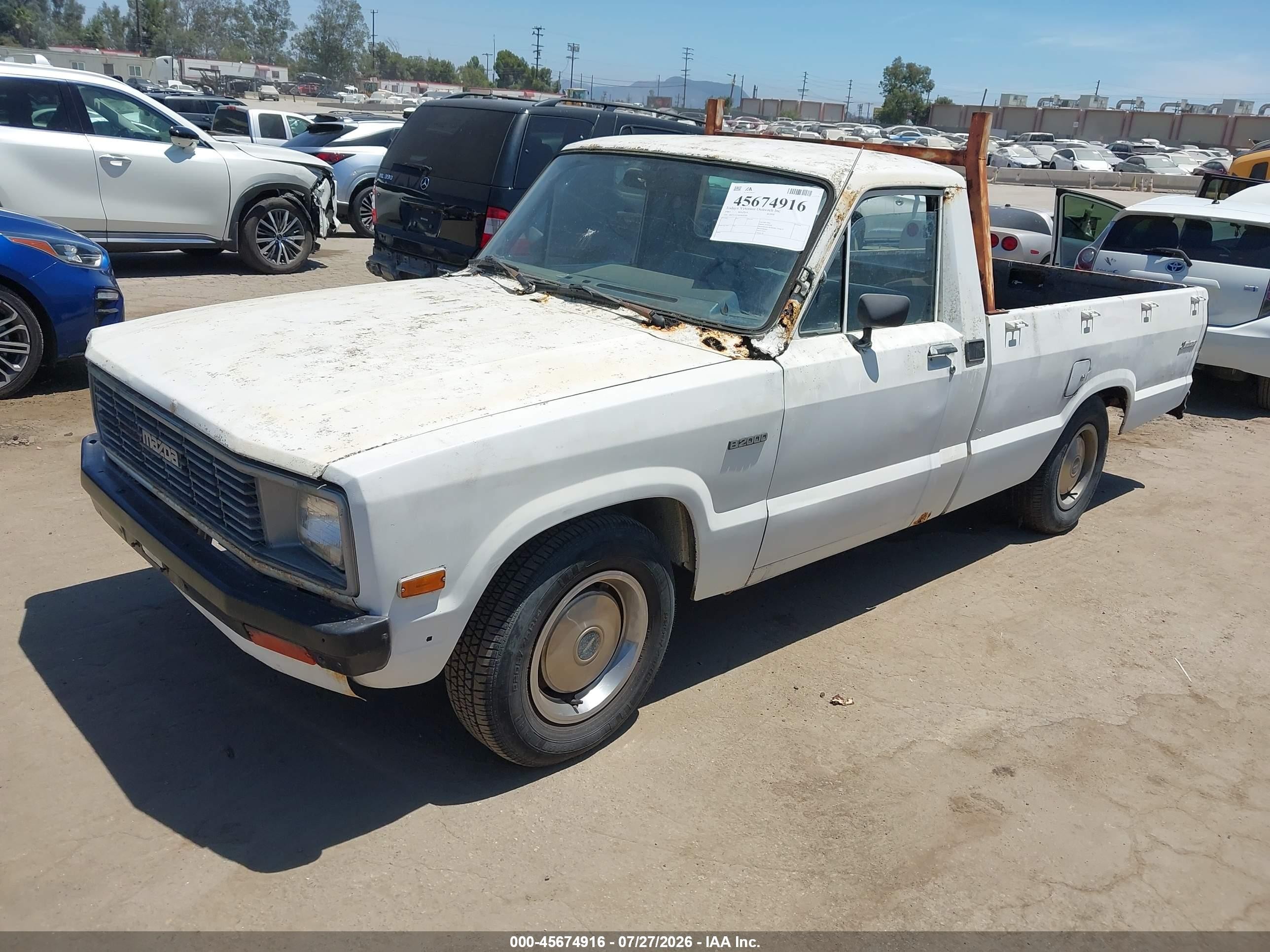 1984 Mazda B2000 Long Bed White vin: JM2UC2214E0830249