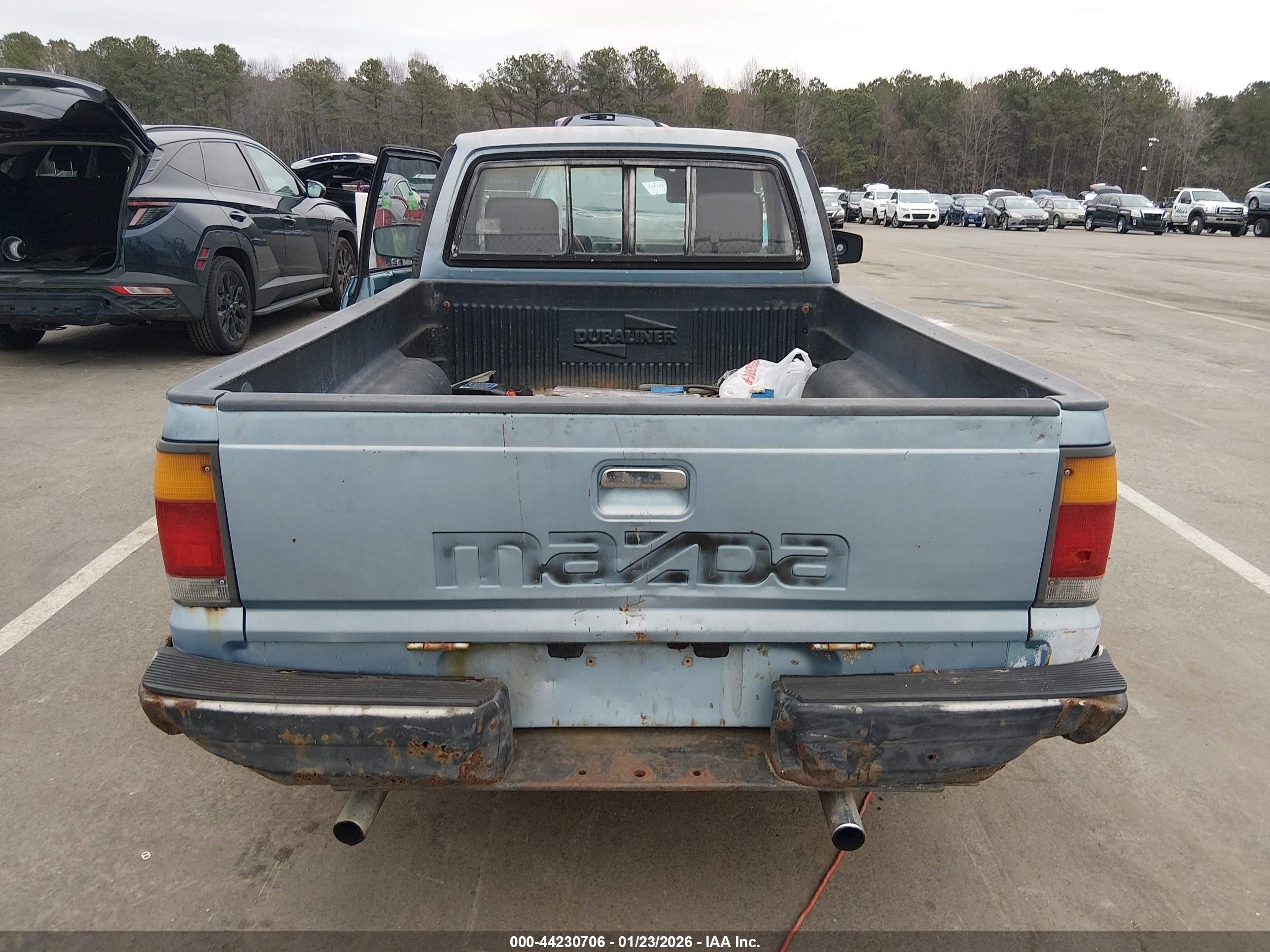 1986 Mazda B2000   Light Blue vin: JM2UF1114G0659394