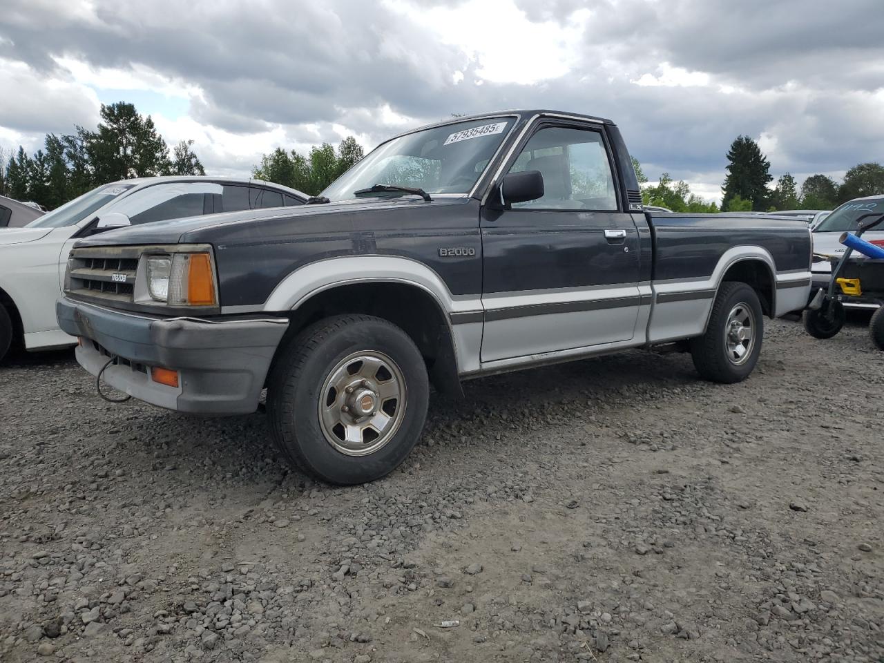 1987 Mazda B2000    Черный vin: JM2UF1114H0569261