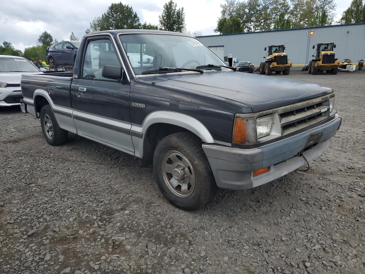 1987 Mazda B2000    Black vin: JM2UF1114H0569261