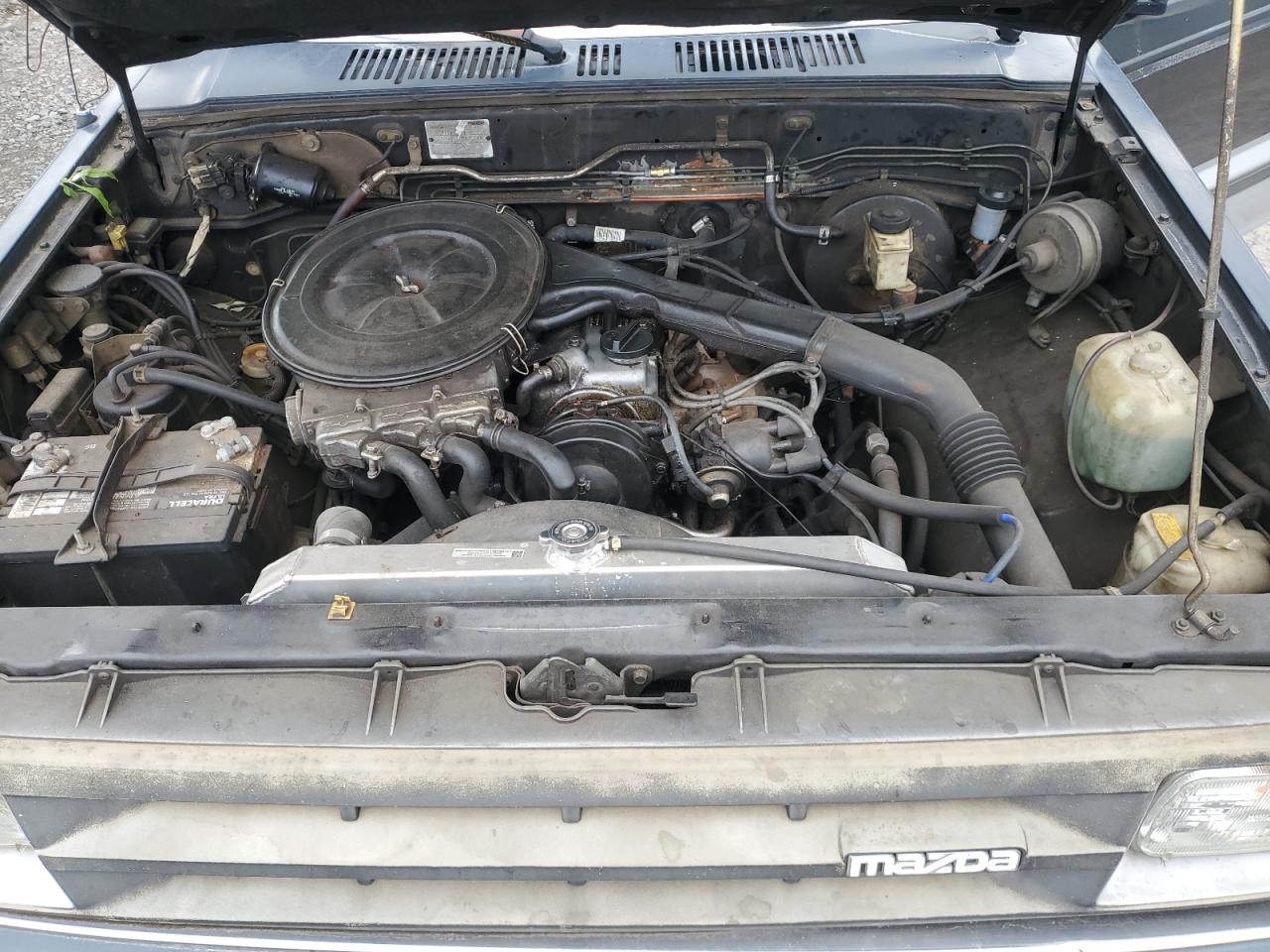 1987 Mazda B2000    Black vin: JM2UF1114H0569261