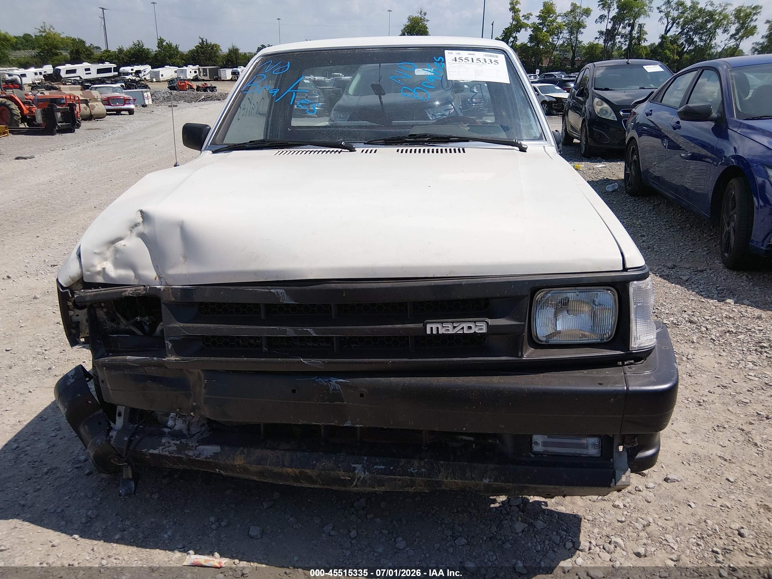 1987 Mazda B2000   White vin: JM2UF1117H0575362