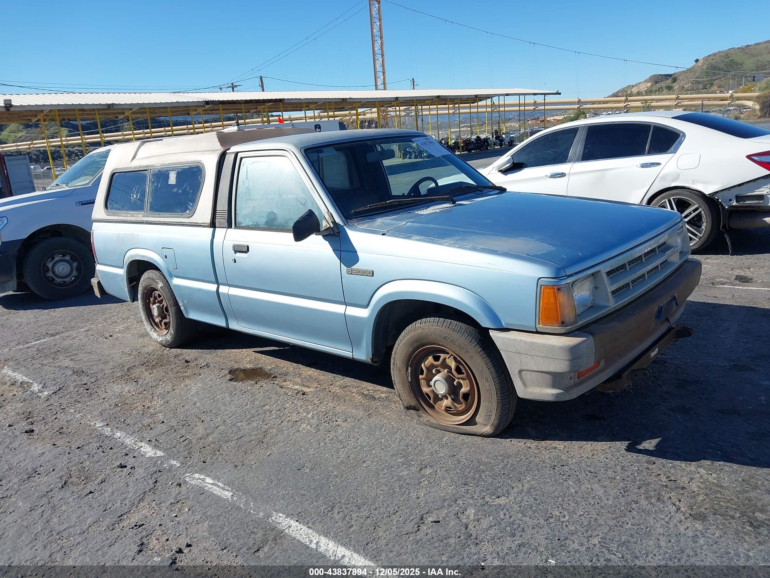 1987 Mazda B2000   Blue vin: JM2UF1117H0592906