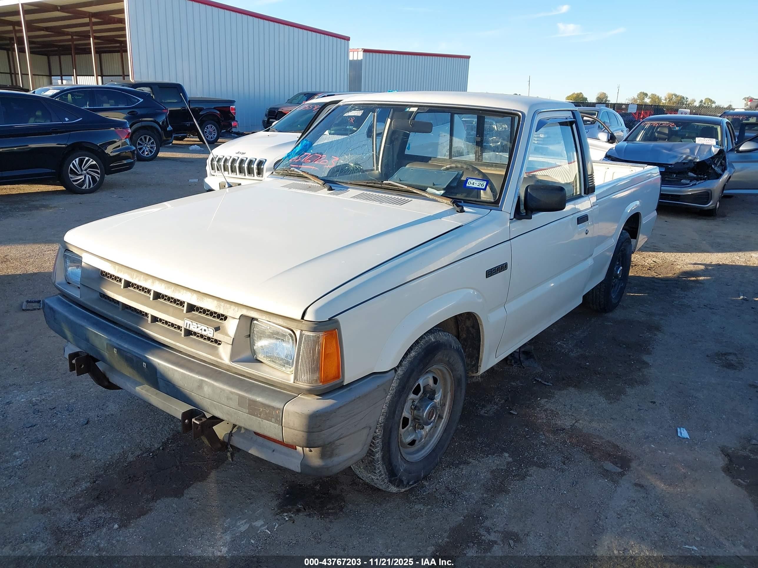 1987 Mazda B2000   White vin: JM2UF111XH0583181