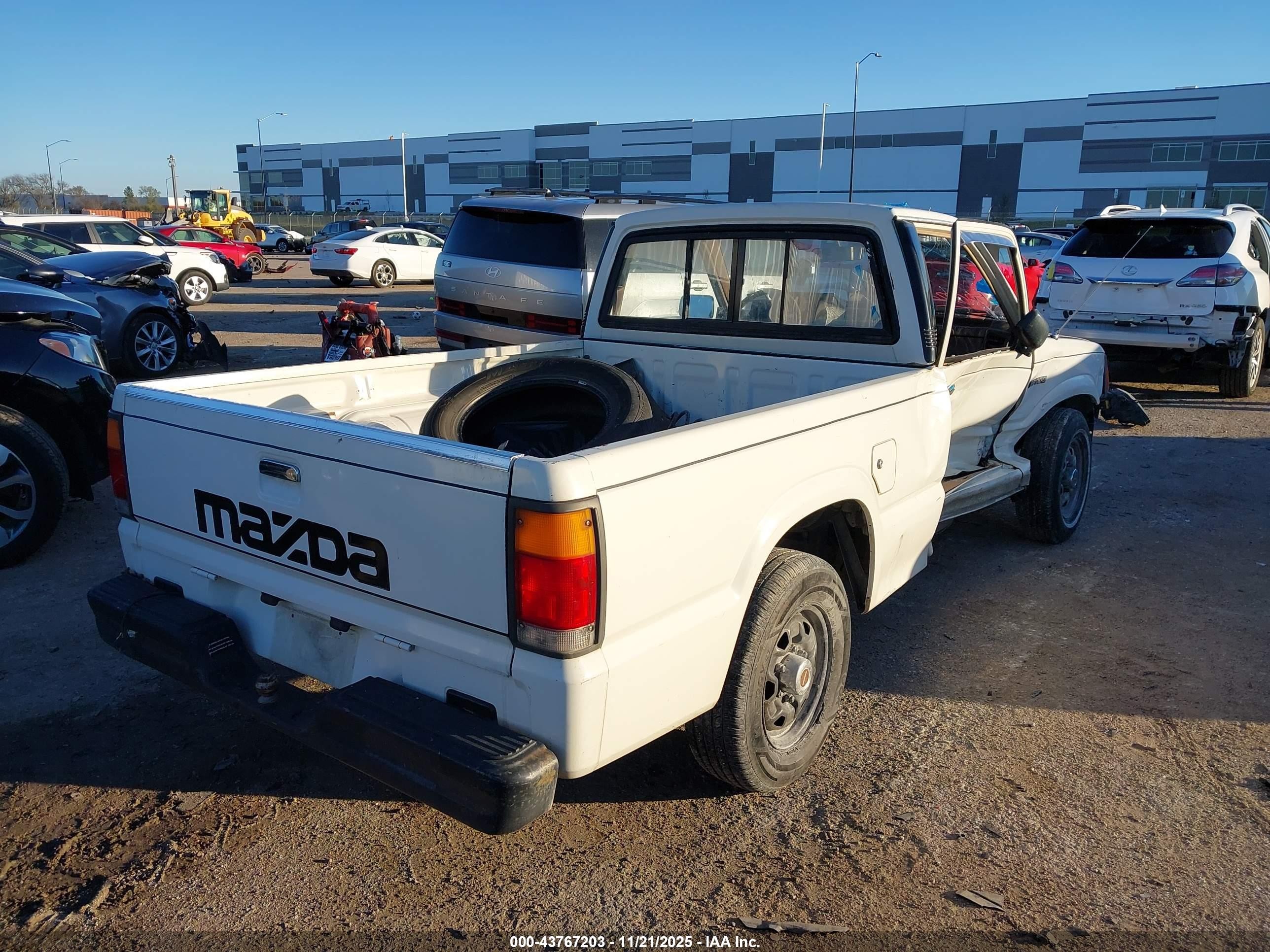 1987 Mazda B2000   White vin: JM2UF111XH0583181