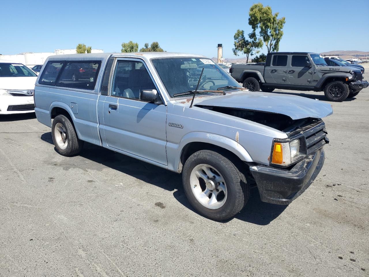 1991 Mazda B2200 Short Bed Blue vin: JM2UF1230M0107158