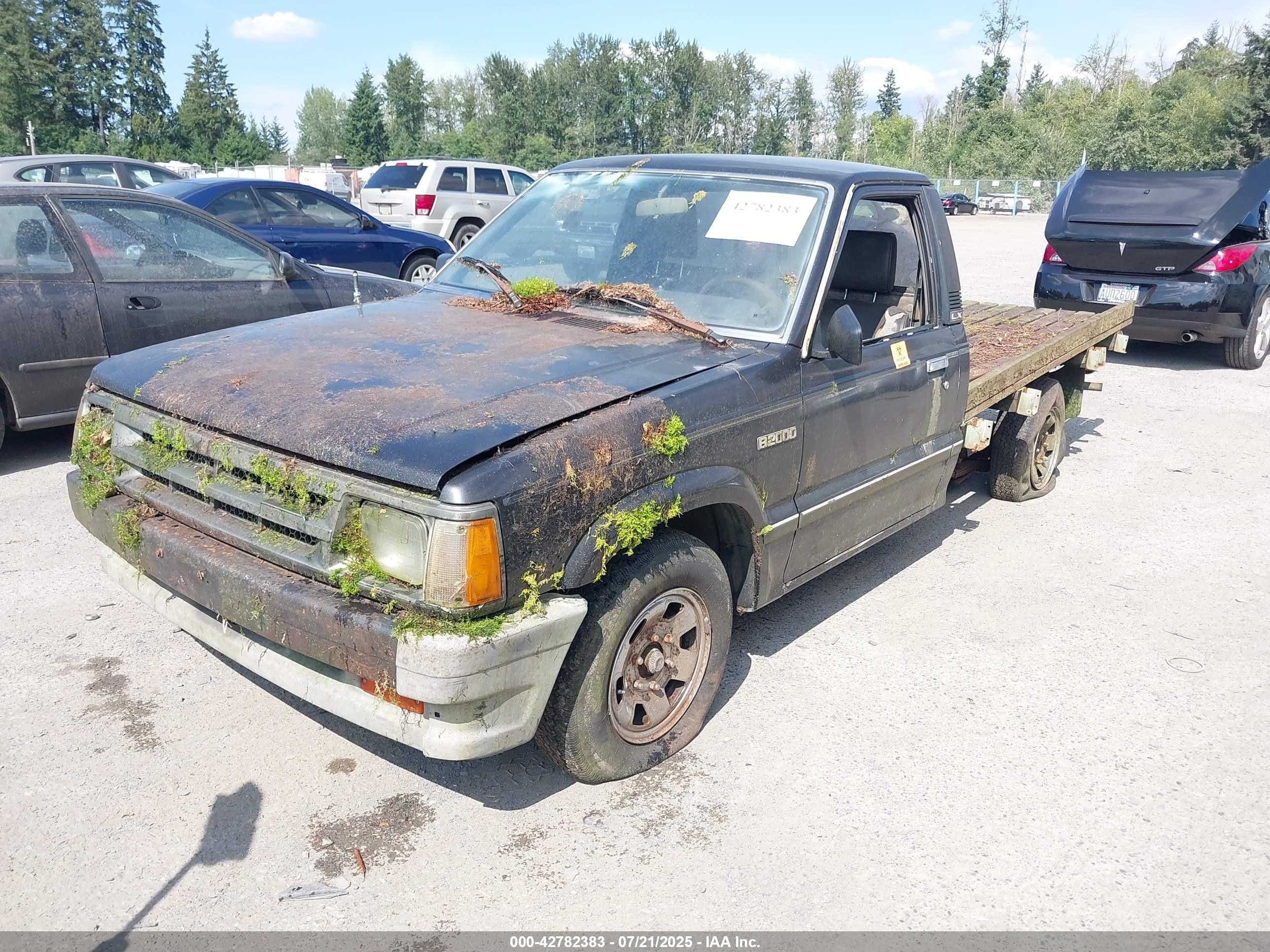1986 Mazda B2000 Long Bed Black vin: JM2UF2113G0524509