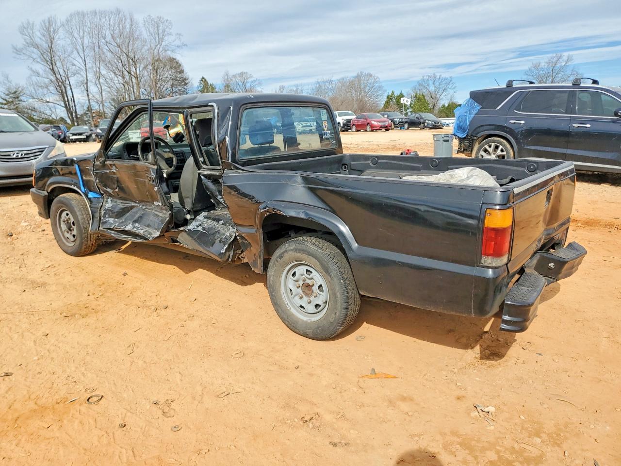 1993 Mazda B2200 Cab Plus Black vin: JM2UF3130P0380523