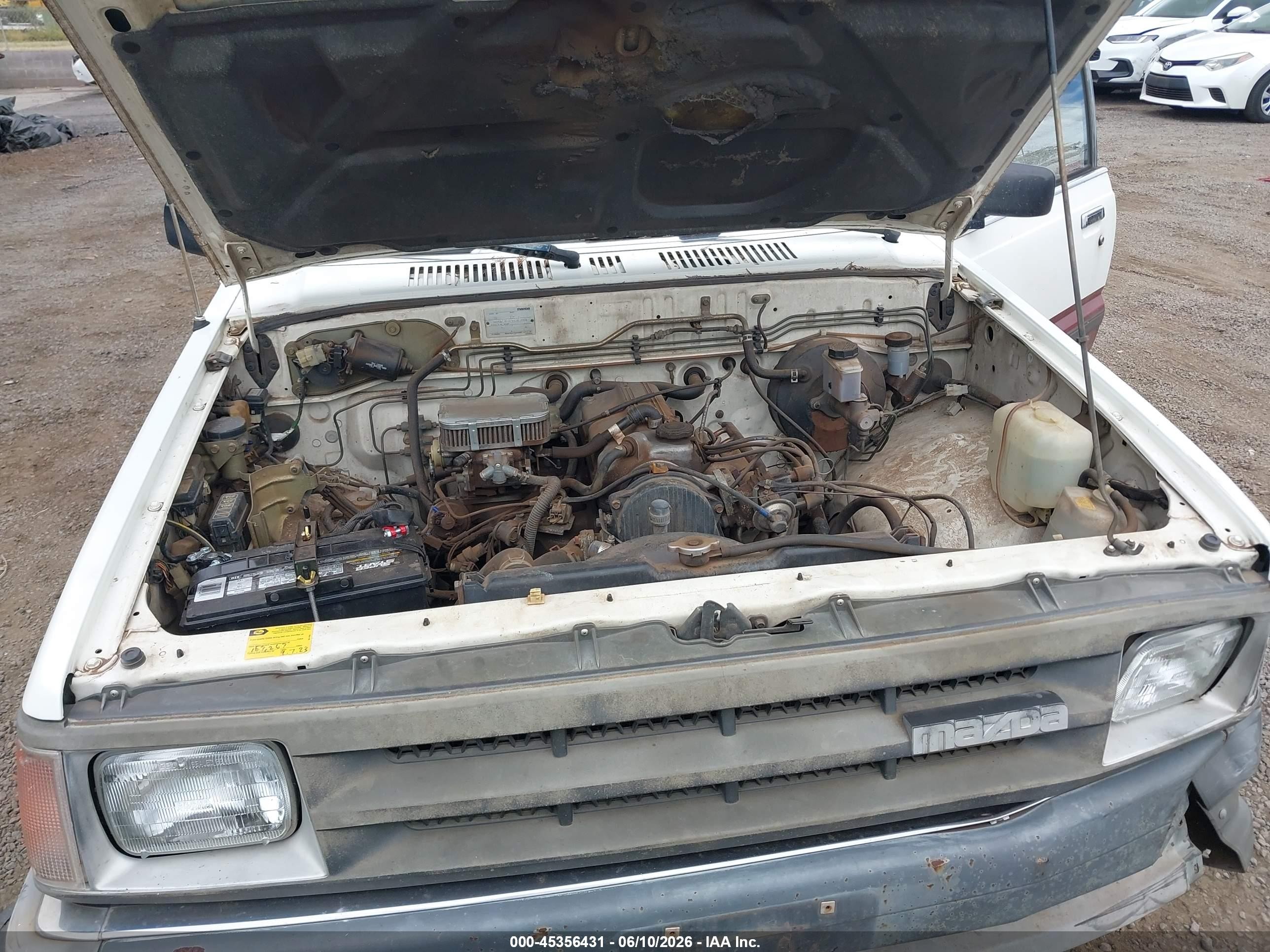 1988 Mazda B2200 Cab Plus White vin: JM2UF3134J0343014