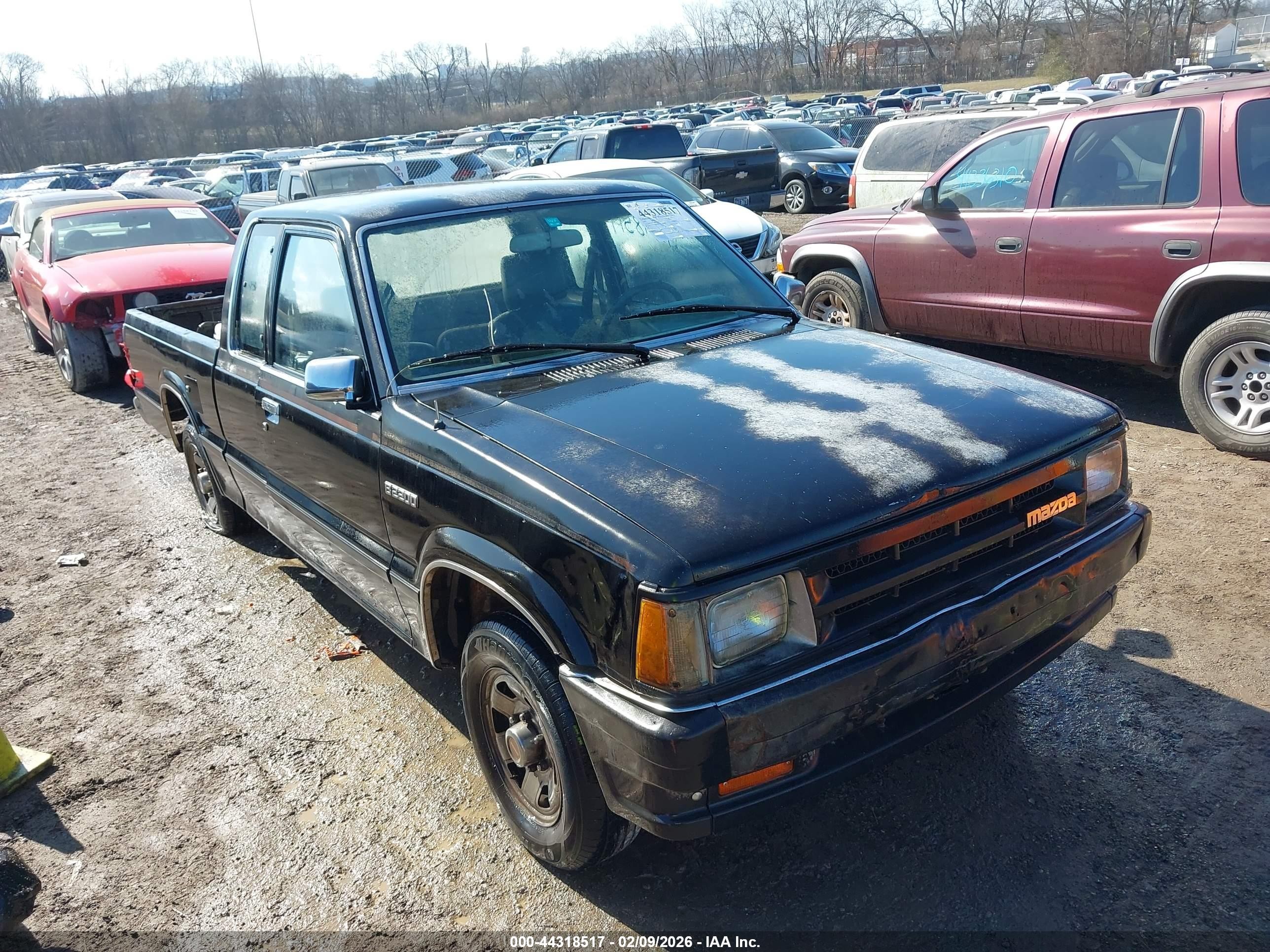 1991 Mazda B2200 Cab Plus Black vin: JM2UF3136M0110448