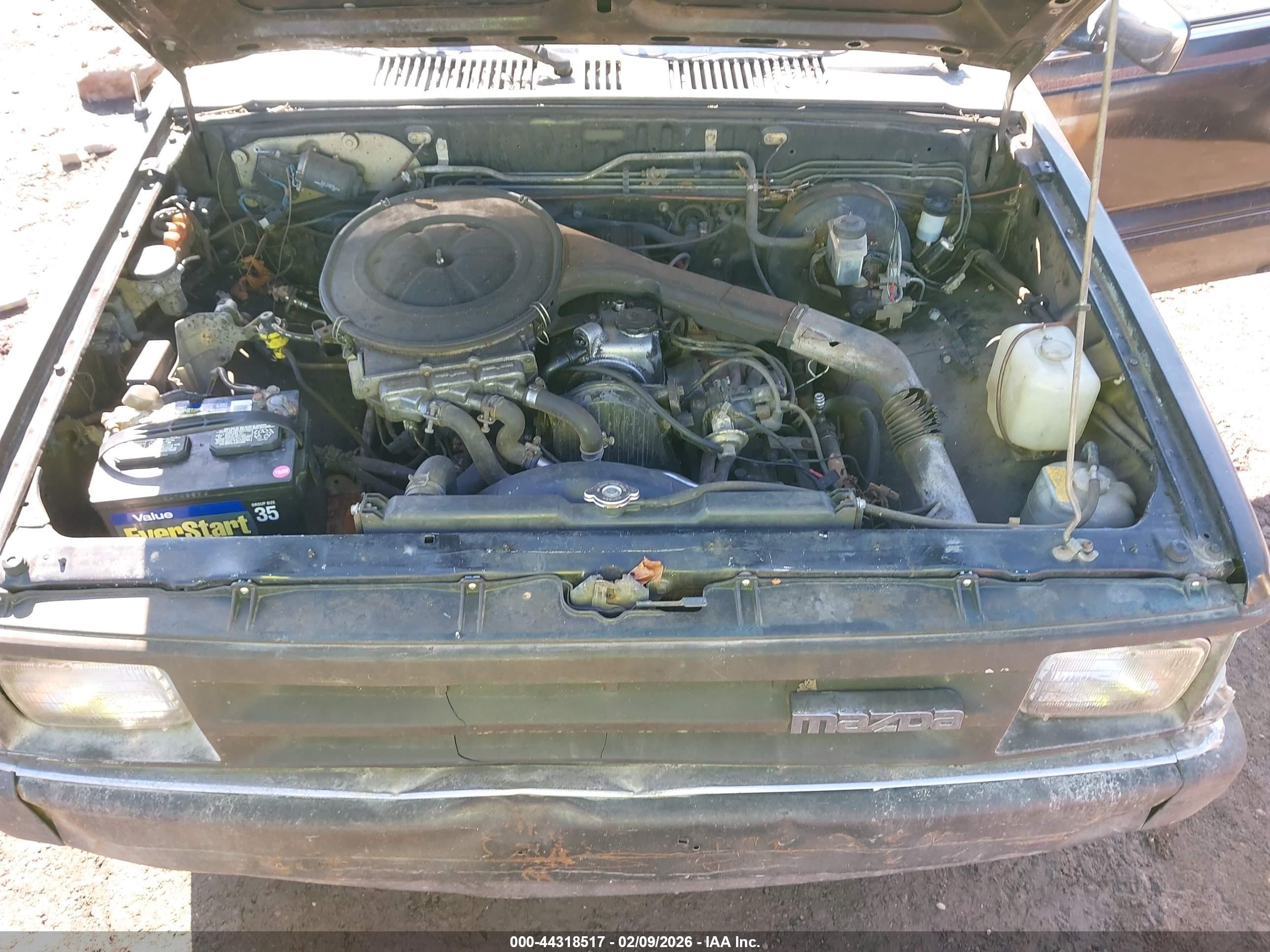 1991 Mazda B2200 Cab Plus Black vin: JM2UF3136M0110448
