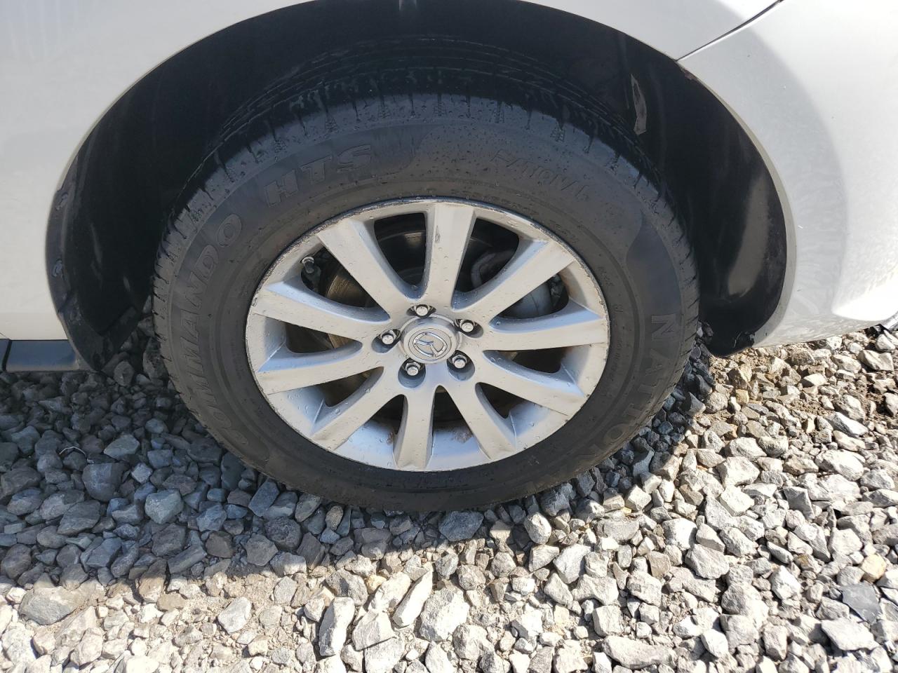2011 Mazda Cx-7 White vin: JM3ER2C54B0355696 Damage: Right Front Wheel, Curb Rash, > 12 Inches
