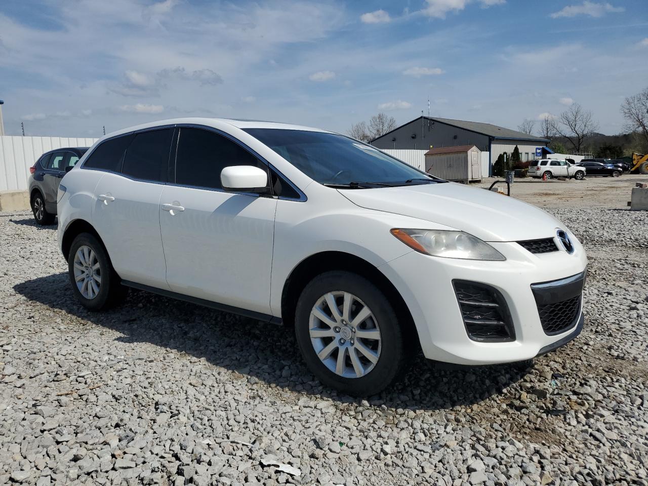 2011 Mazda Cx-7 White vin: JM3ER2C54B0355696 Damage: Right Front Fender, Heavy Scratch, 1/8 To 1/2 Inch
