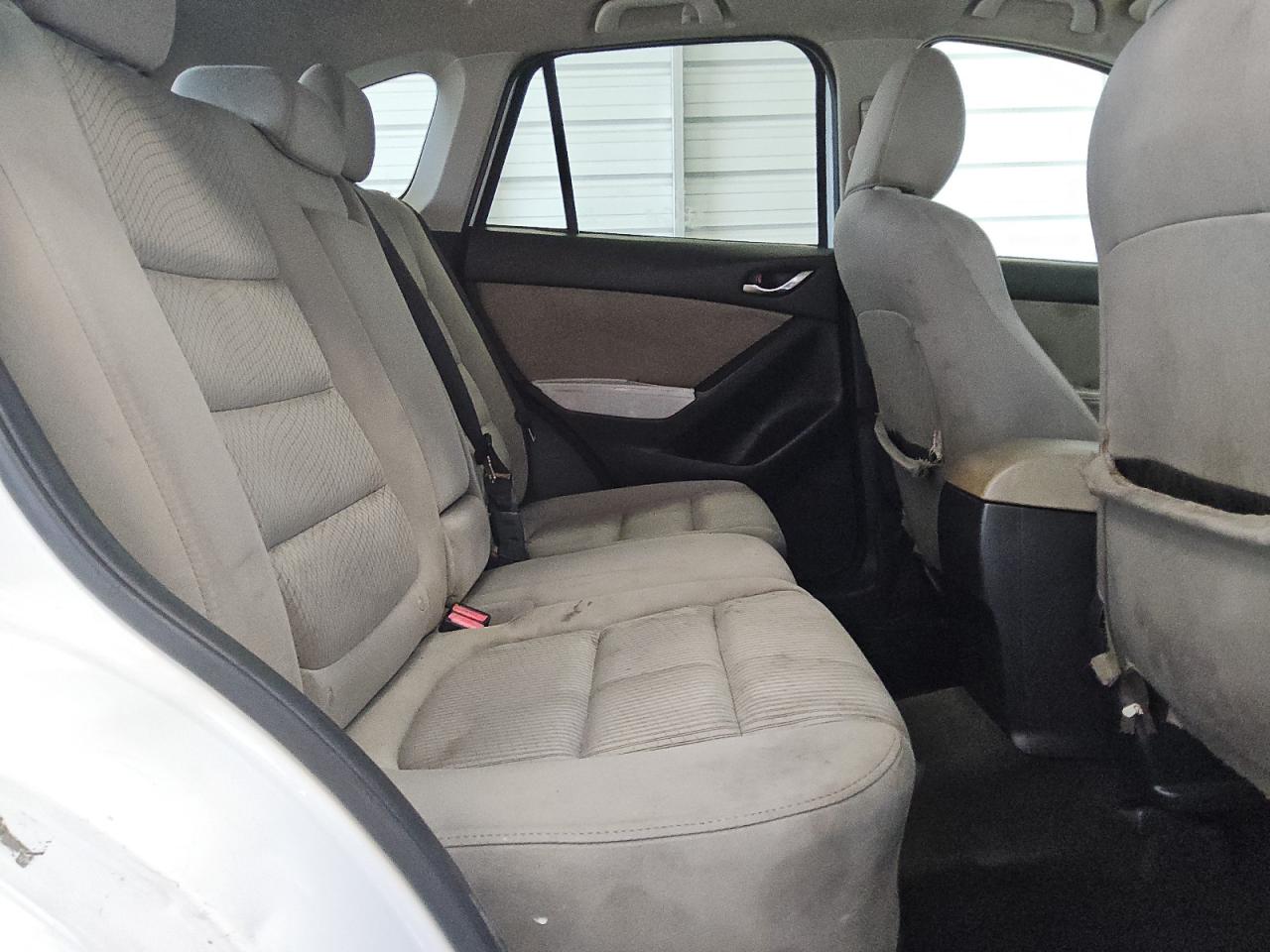 2014 Mazda Cx-5 Touring White vin: JM3KE2CYXE0340035 Damage: Left Rear Seat, Stained, Permanent
