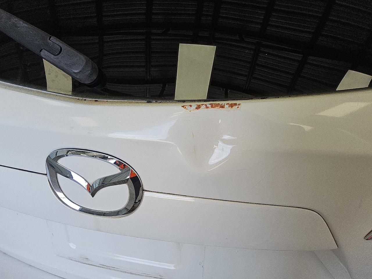 2014 Mazda Cx-5 Touring White vin: JM3KE2CYXE0340035 Damage: Lift Gate, Dent(S) W/ Paint Dmg, 6 To 7 Inches