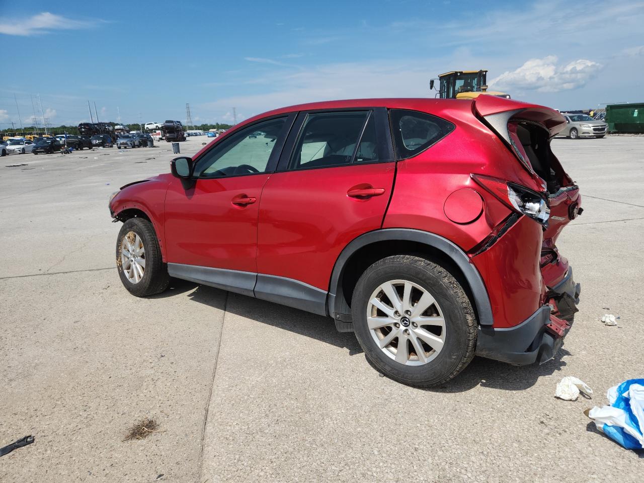 2015 Mazda Cx-5 Awd Red vin: JM3KE4BY0F0480027 Damage: Left Qtr Panel, Dent(S) W/ Paint Dmg, > 12 Inches