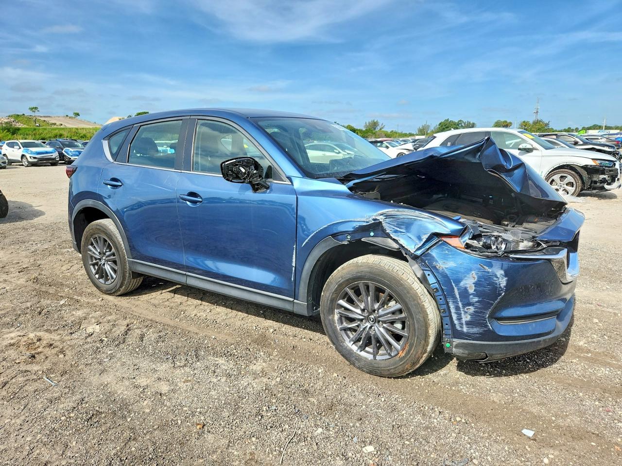 2021 Mazda Cx-5 Sport Blue vin: JM3KFABM9M1305033