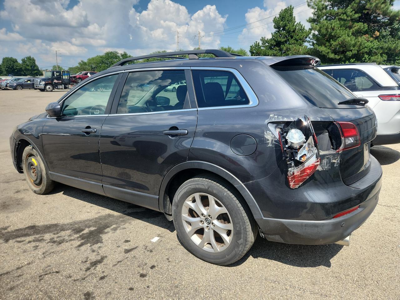 2014 Mazda Cx-9 Touring Black vin: JM3TB3CV8E0442457 Damage: Left Qtr Panel, Heavy Scratch, 6 To 7 Inches