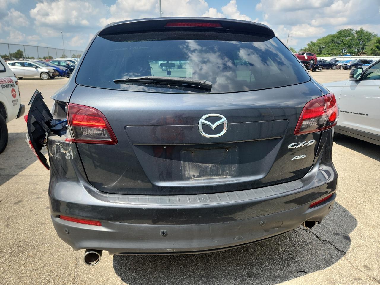 2014 Mazda Cx-9 Touring Black vin: JM3TB3CV8E0442457 Damage: Rear Bumper Molding, Broken, Replacement Required