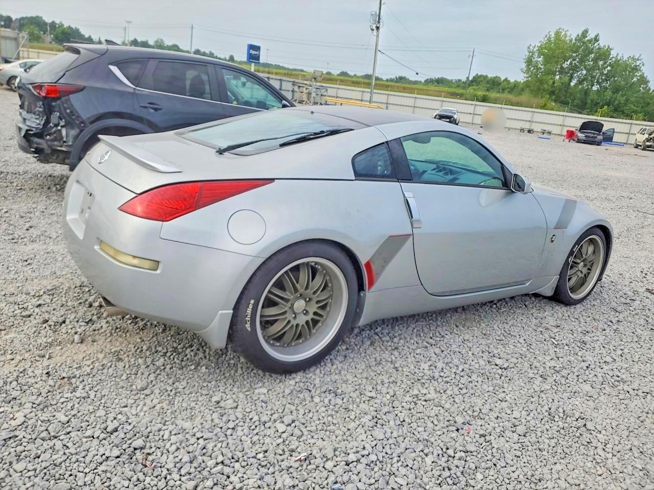 2003 Nissan 350z Coupe Серебряный vin: JN1AZ34D13T105189