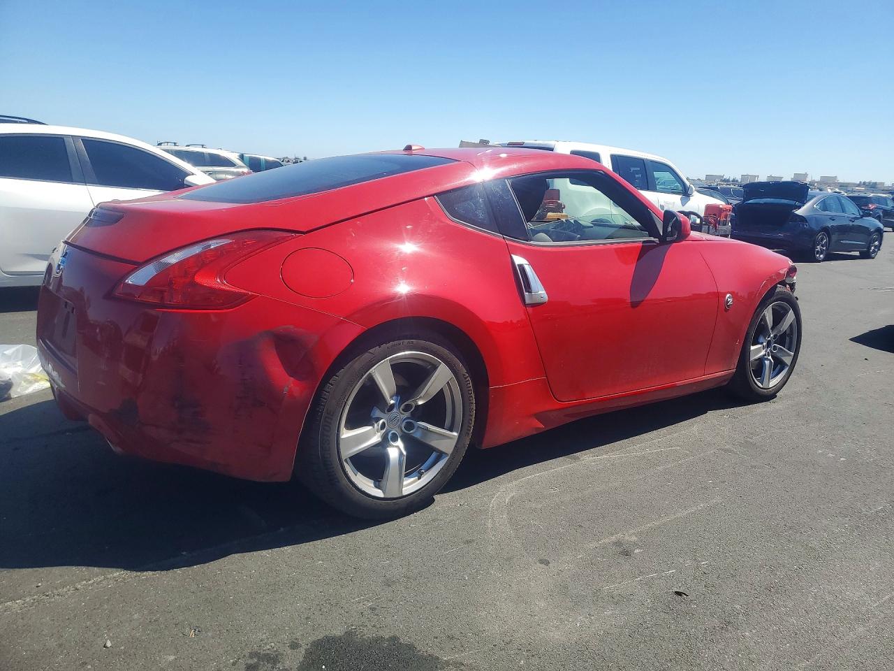 2009 Nissan 370z Base Red vin: JN1AZ44E09M407106