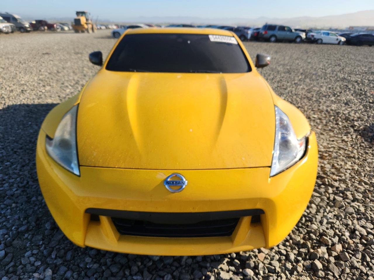 2009 Nissan 370z Base Yellow vin: JN1AZ44E19M402335