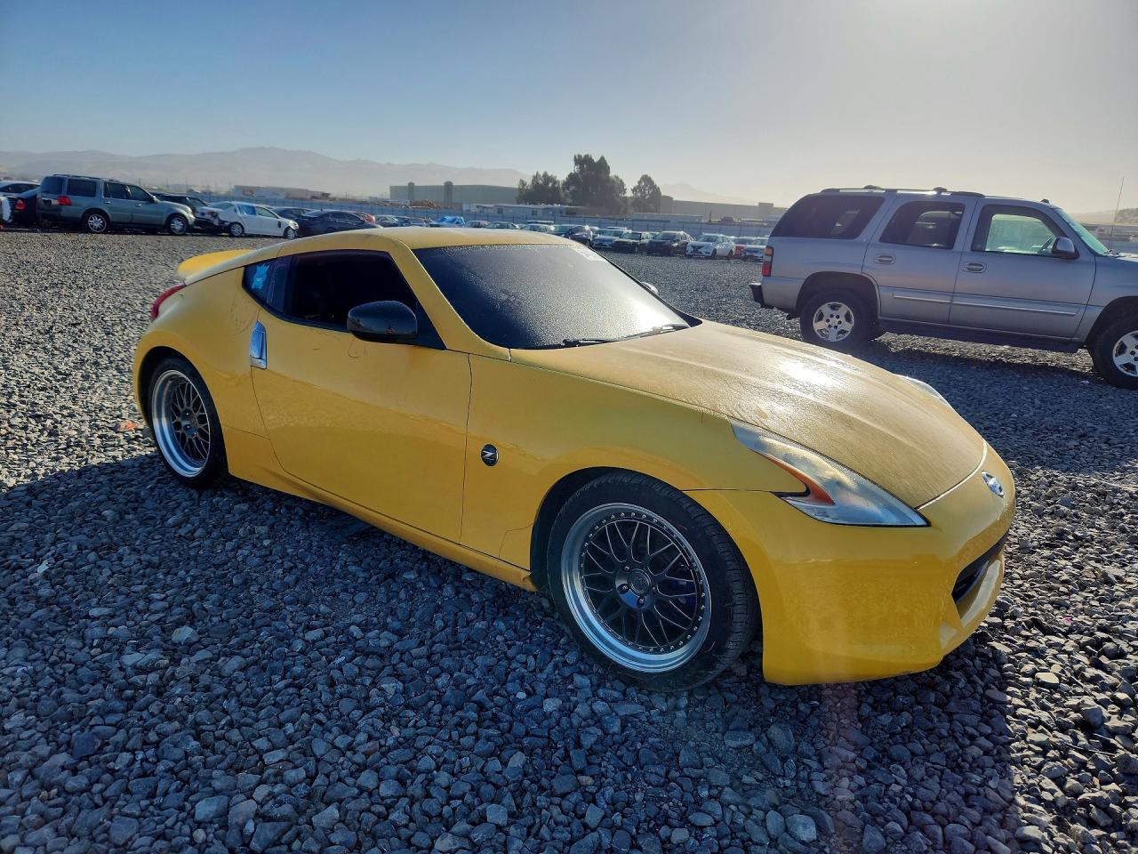 2009 Nissan 370z Base Yellow vin: JN1AZ44E19M402335