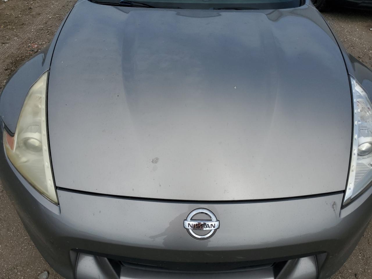2010 Nissan 370z Roadster Gray vin: JN1AZ4FHXAM303850 Damage: Left Head Lamp, Faded, Repair Required