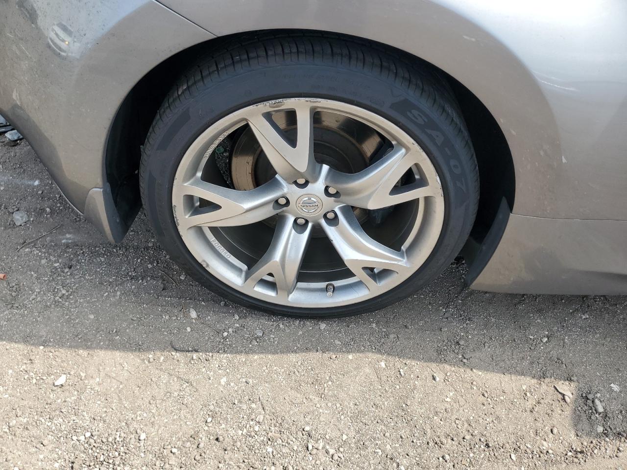 2010 Nissan 370z Roadster Gray vin: JN1AZ4FHXAM303850 Damage: Right Qtr Panel, Multiple Scratches Light, 3