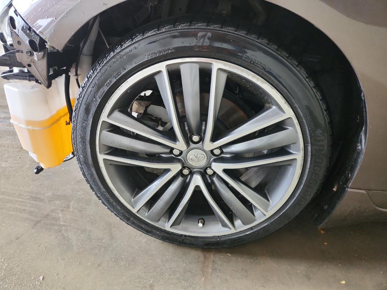 2014 Infiniti Q50 Base Brown vin: JN1BV7AP5EM674856 Damage: Left Front Wheel, Curb Rash, 7 To 8 Inches