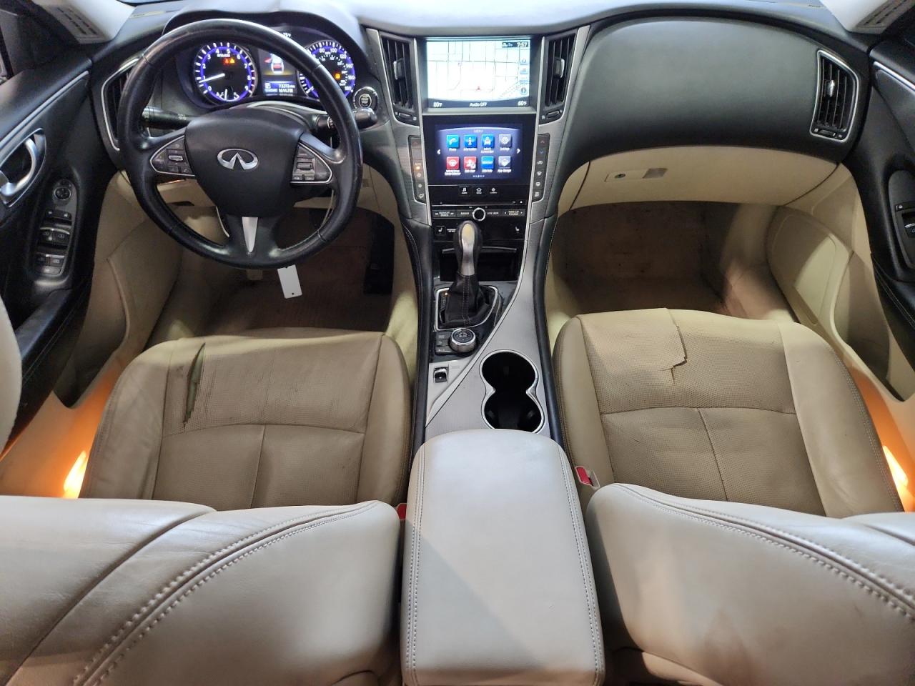 2014 Infiniti Q50 Base Brown vin: JN1BV7AP5EM674856 Damage: Left Front Seat, Torn, > 12 Inches