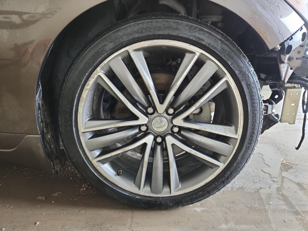 2014 Infiniti Q50 Base Brown vin: JN1BV7AP5EM674856 Damage: Right Front Wheel, Curb Rash, > 12 Inches