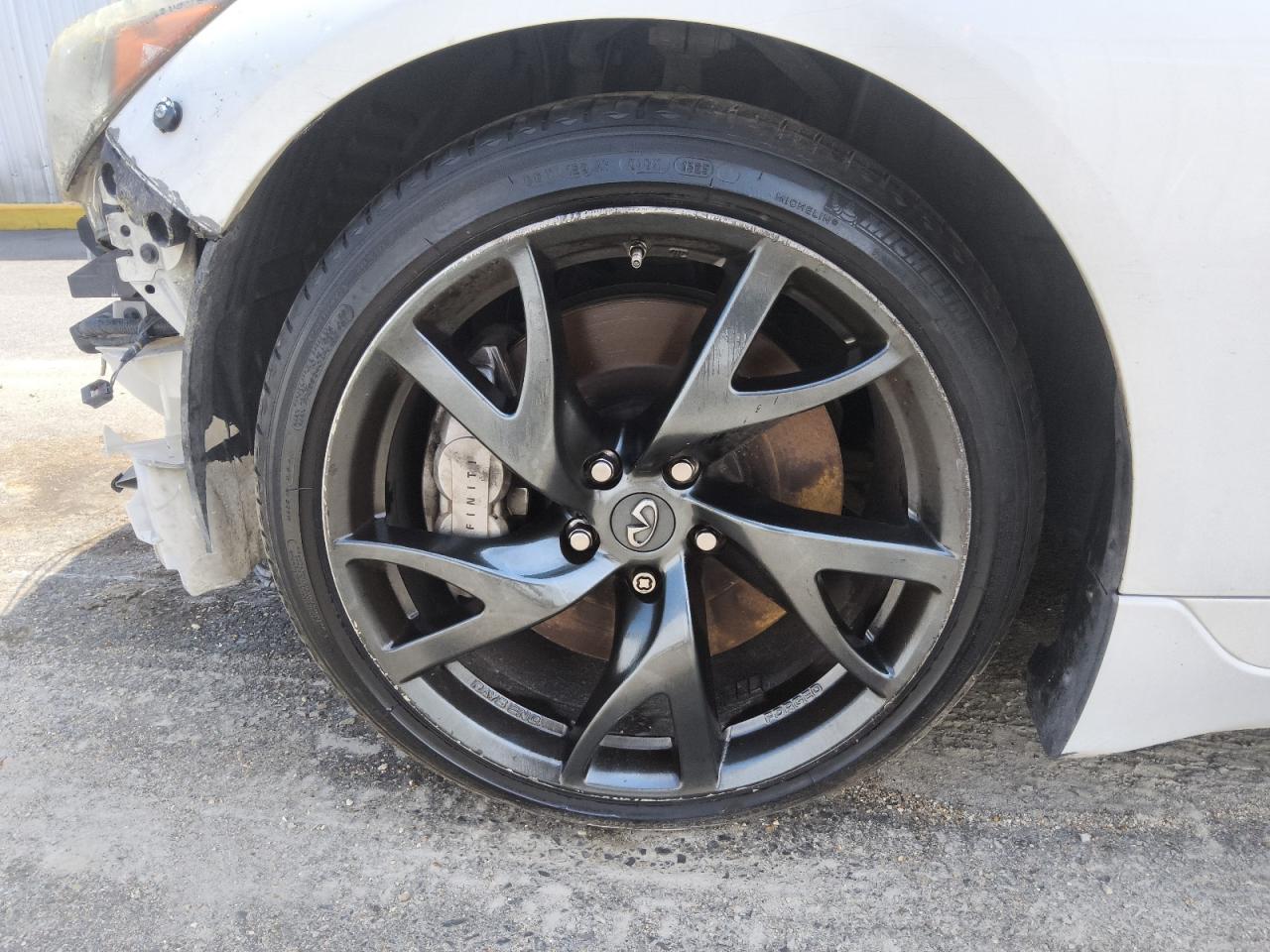 2015 Infiniti Q50 Sport White vin: JN1BV7AP5FM340232 Damage: Left Front Wheel, Curb Rash, > 12 Inches