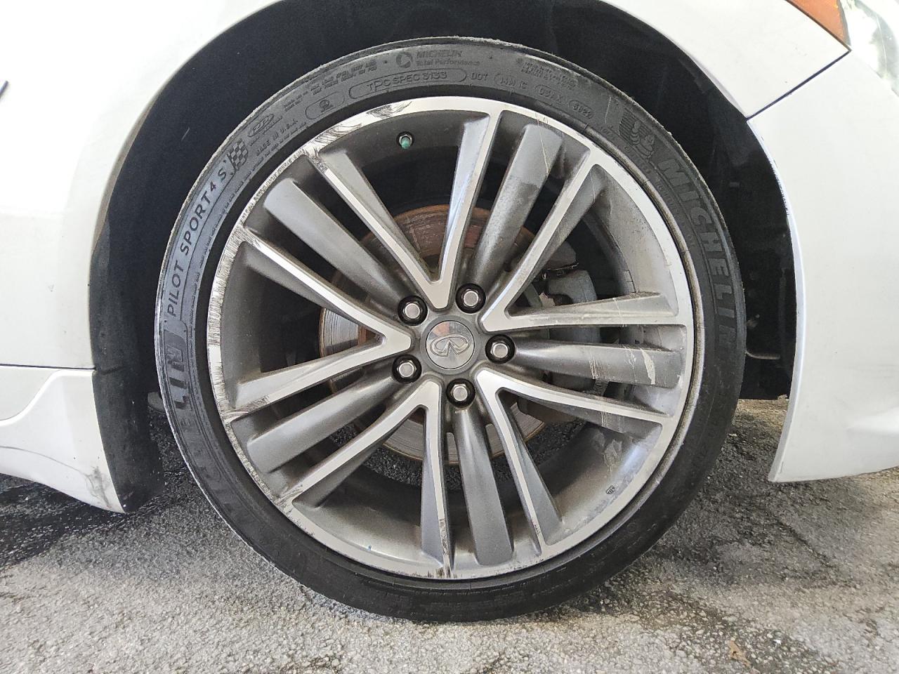 2015 Infiniti Q50 Premium White vin: JN1BV7AP9FM338144 Damage: Right Front Tire, Worn, Replacement Required
