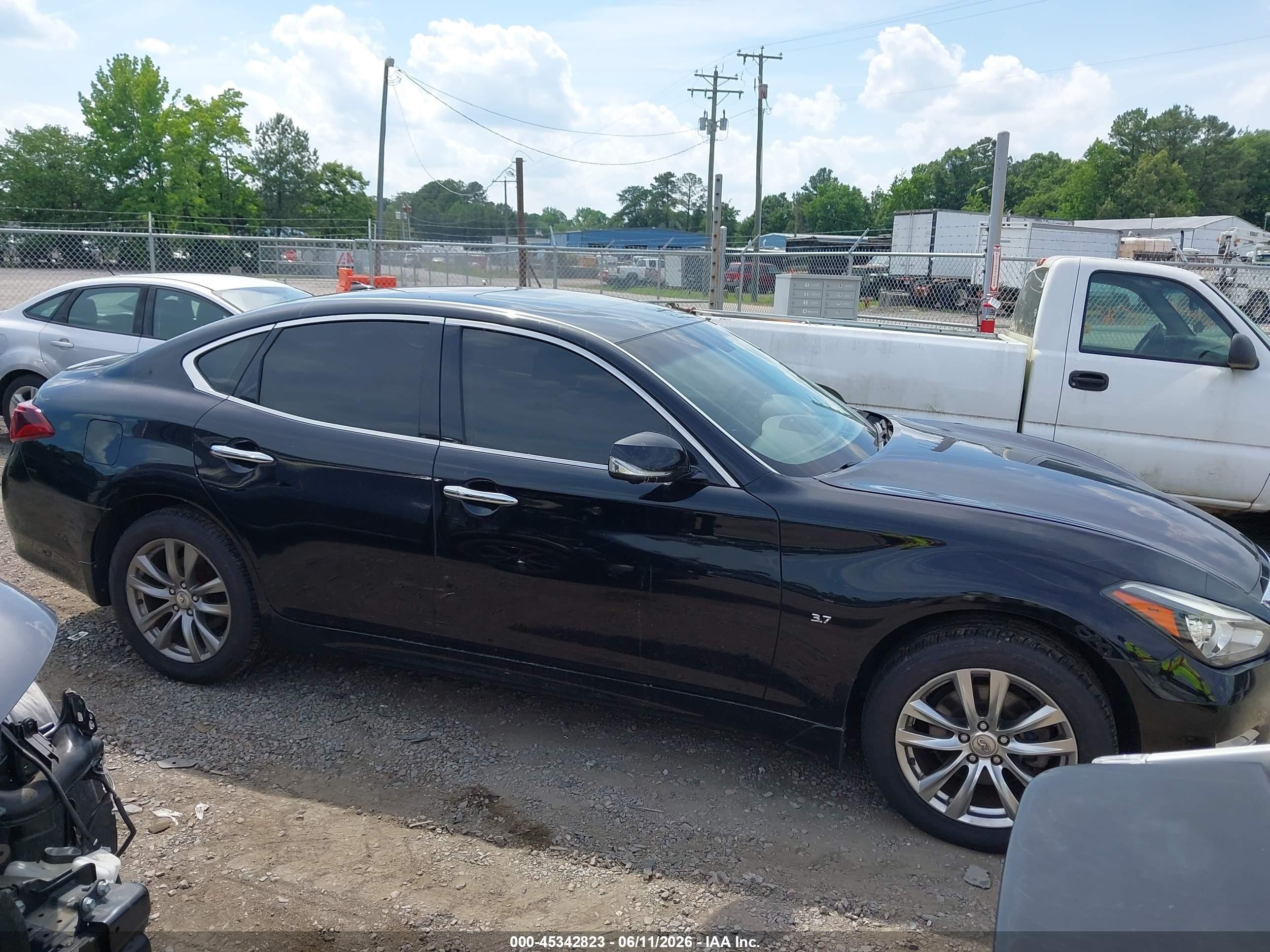2015 Infiniti Q70 3.7x Black vin: JN1BY1AR0FM561050
