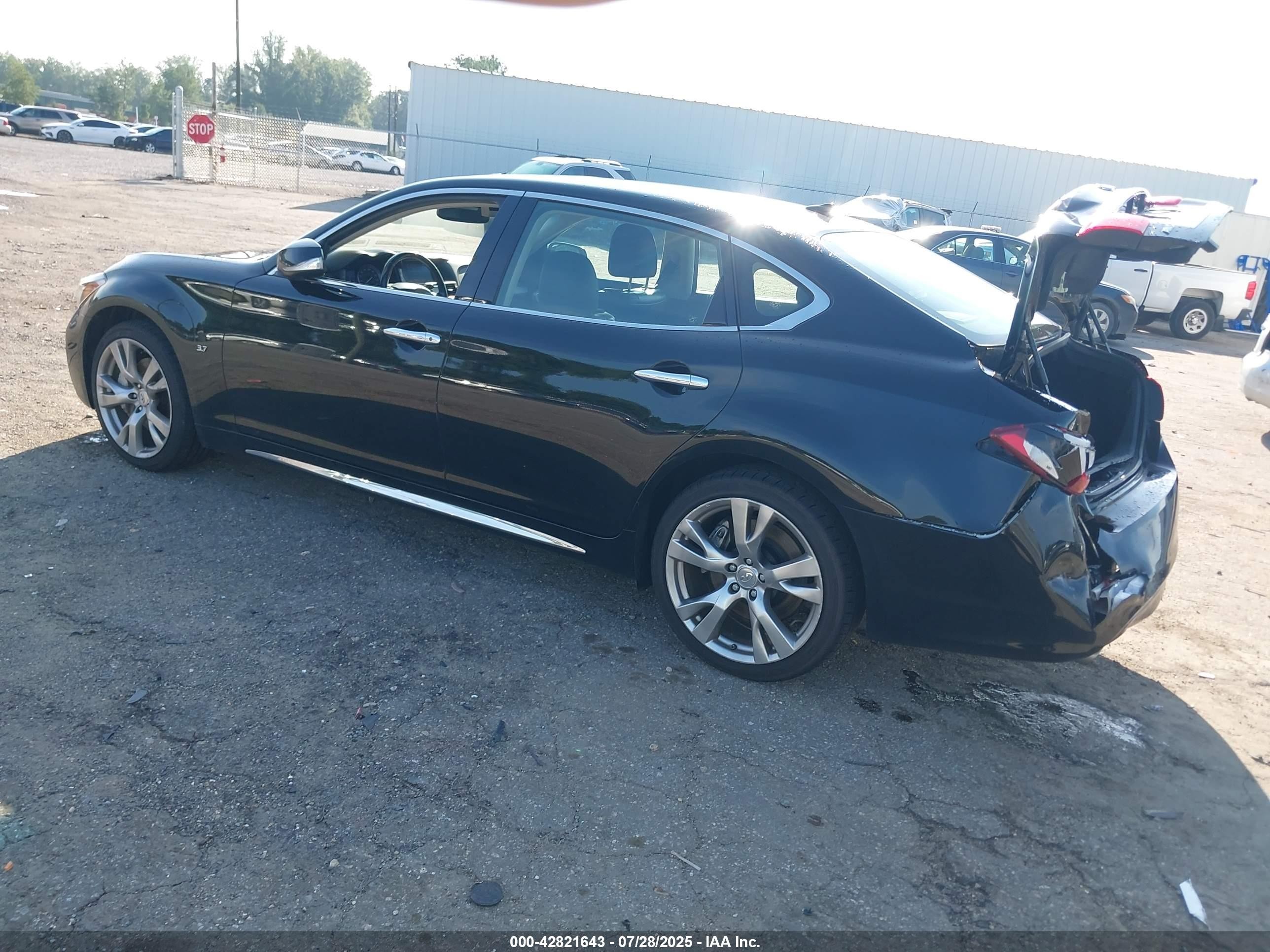 2018 Infiniti Q70l 3.7x Luxe Black vin: JN1BY1PR4JM370201