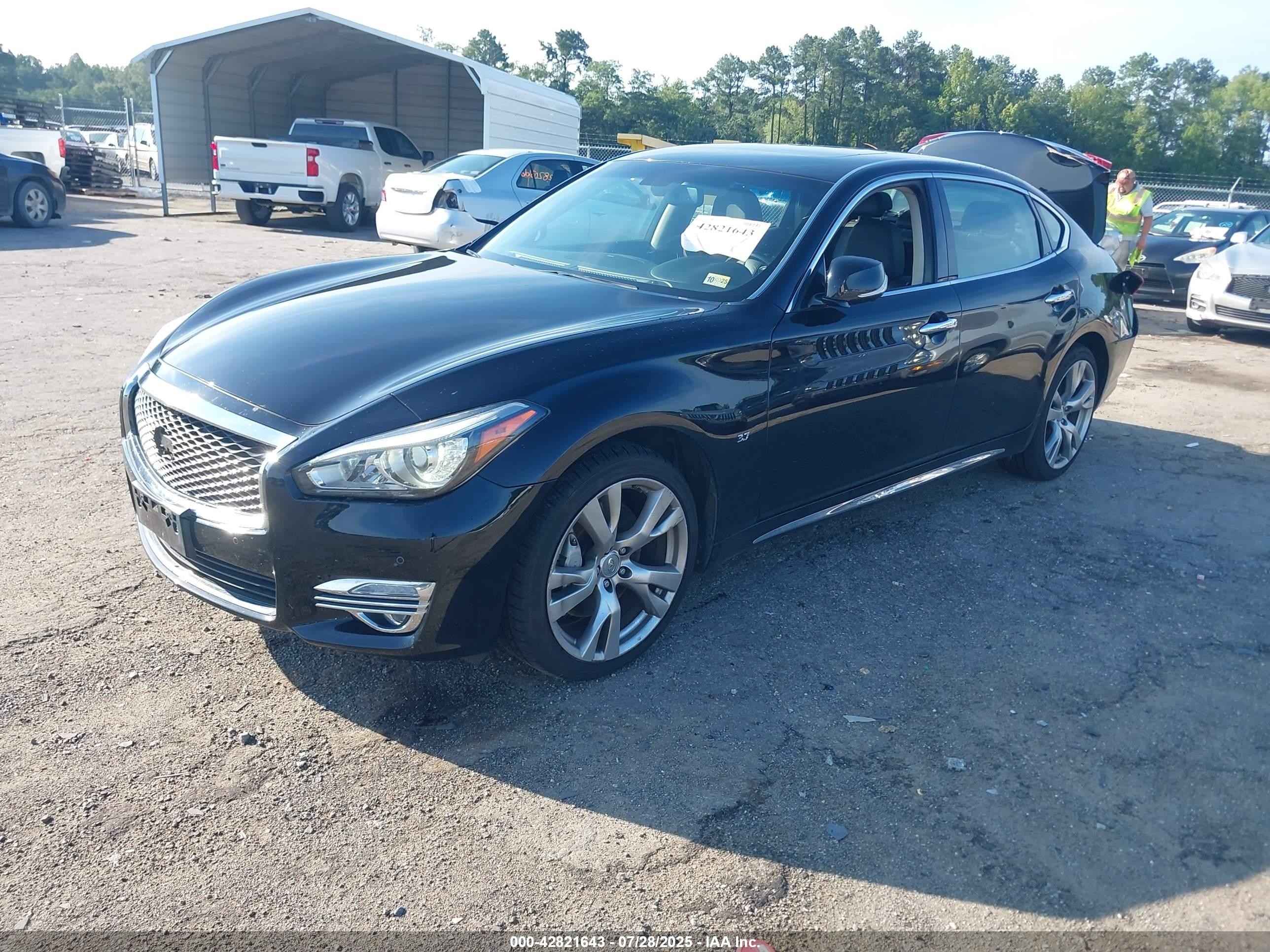 2018 Infiniti Q70l 3.7x Luxe Black vin: JN1BY1PR4JM370201
