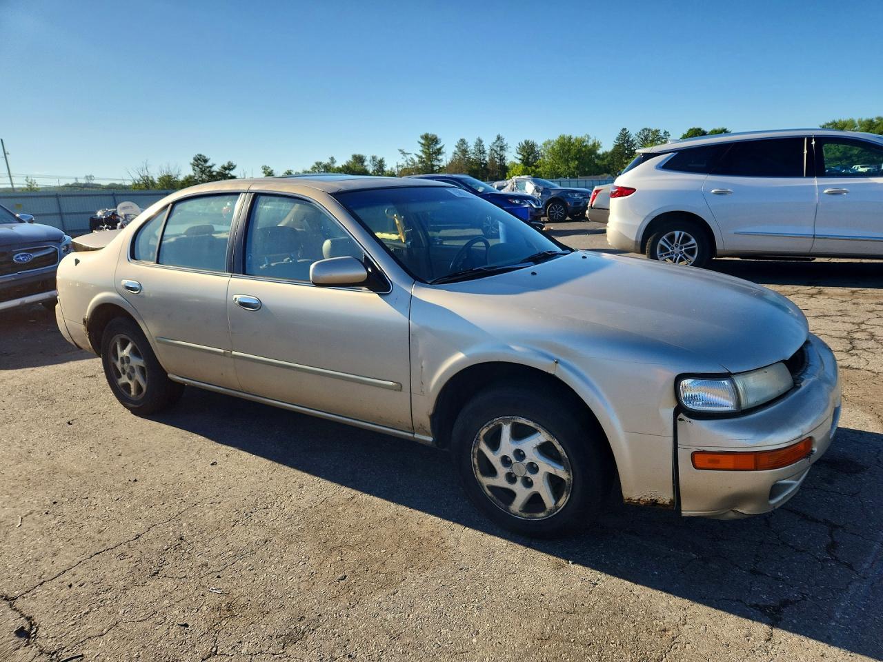 1998 Nissan Maxima Se Tan vin: JN1CA21A0WM807264