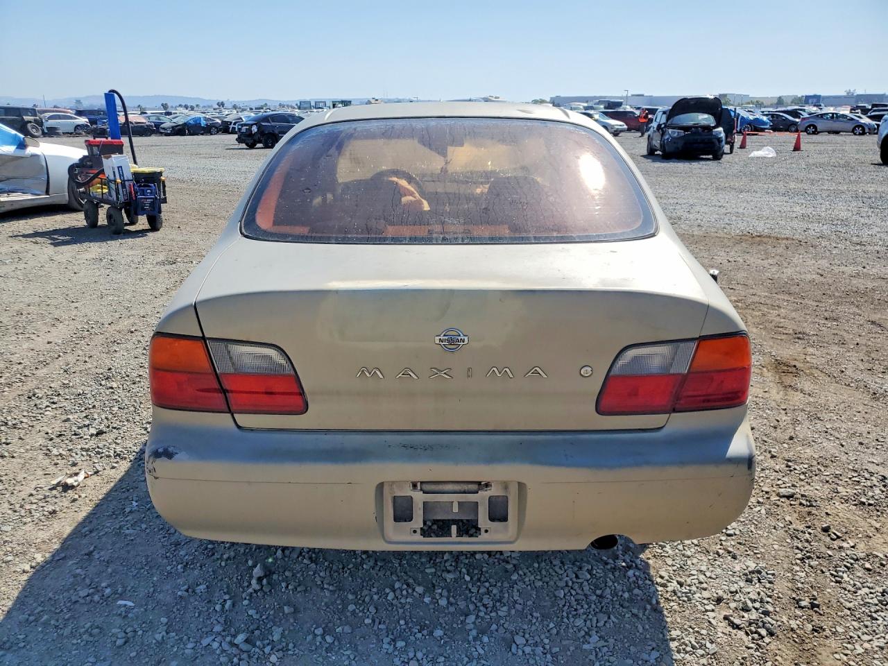 1995 Nissan Maxima Gxe Tan vin: JN1CA21D0ST005811