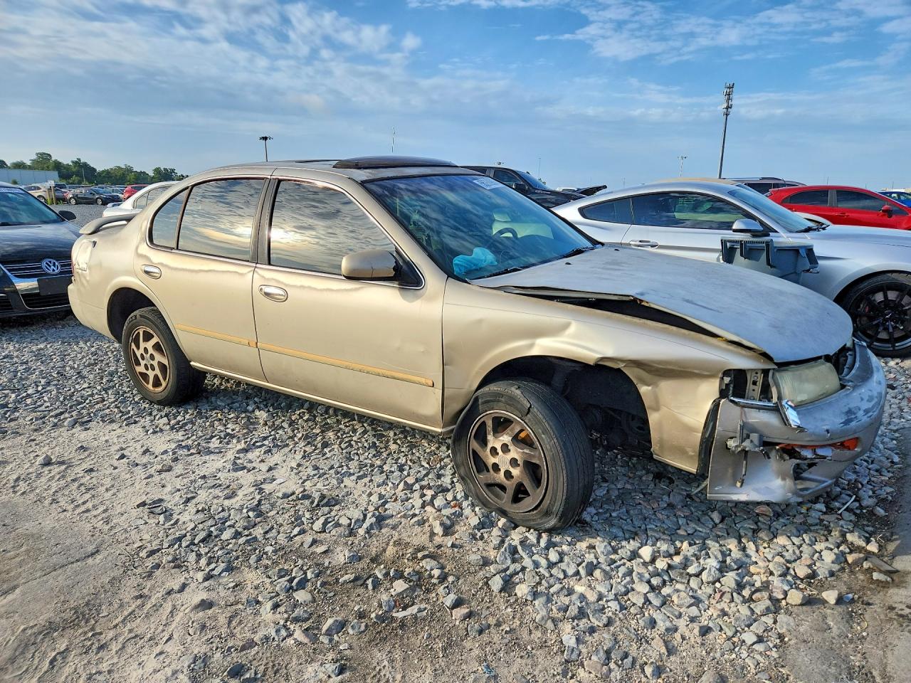 1998 Nissan Maxima Gxe Gold vin: JN1CA21D0WM912588