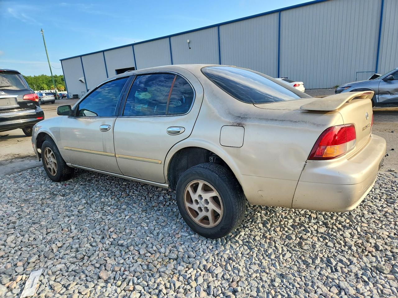 1998 Nissan Maxima Gxe Gold vin: JN1CA21D0WM912588