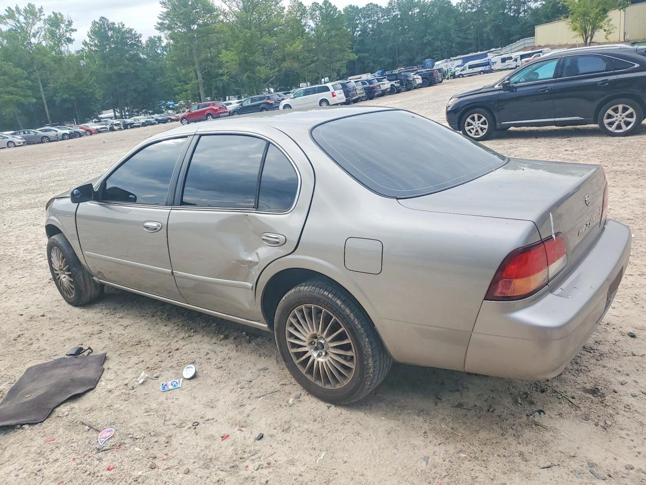 1999 Nissan Maxima Gxe Tan vin: JN1CA21D1XT202798